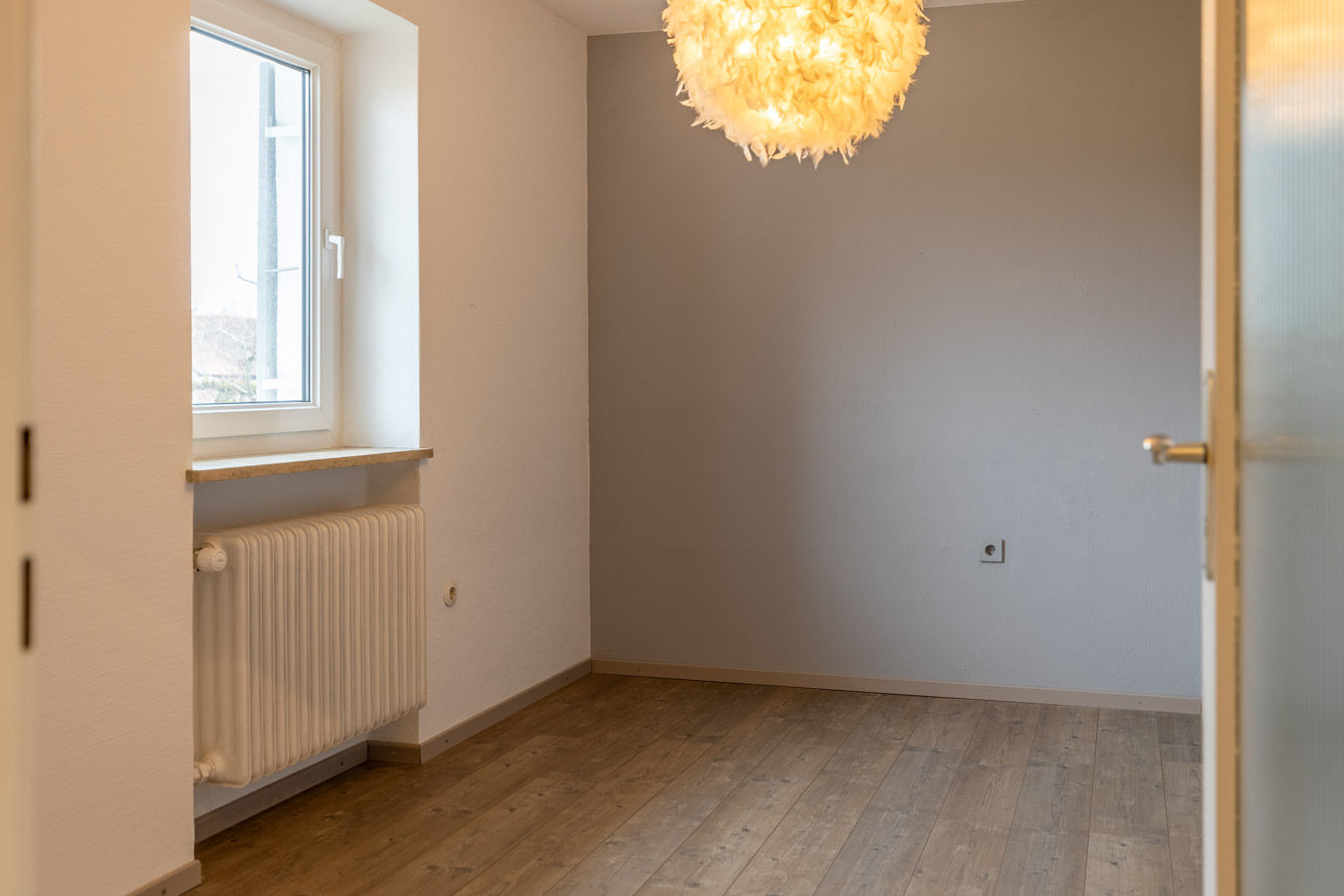 Familienidyll in Bogenhausen: Doppelhaushälfte mit sonnigem Westgarten & Grünblick